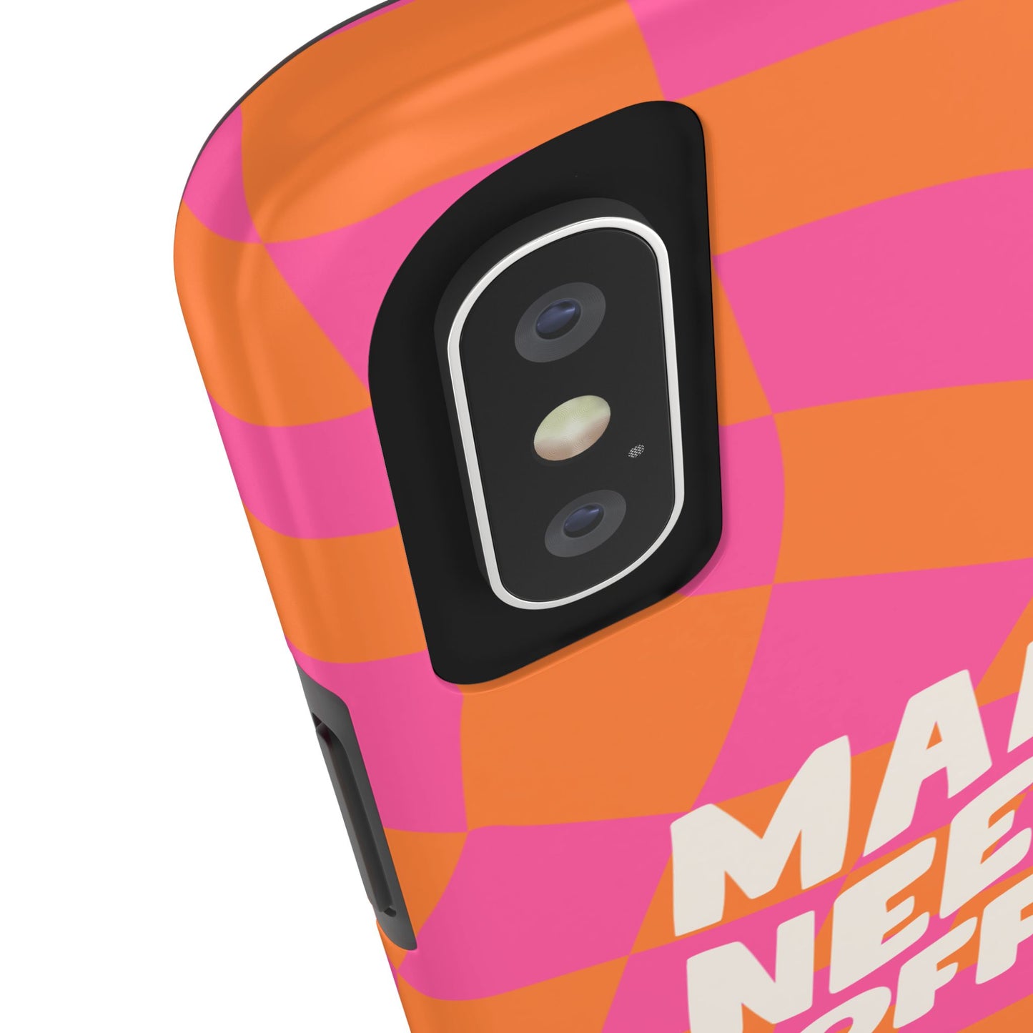 Close-up of a smartphone with the "Mama Needs Coffee" Funny Tough Phone Case in a pink and orange checkered design. Bold white text and the phone’s dual camera and side buttons are visible.