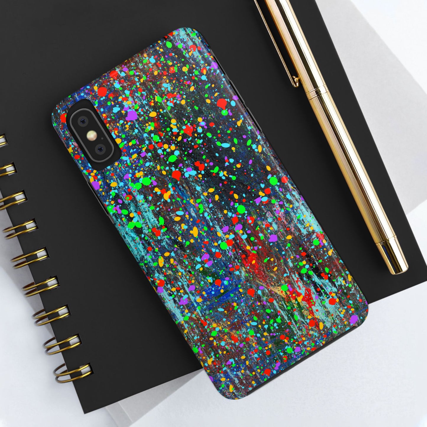Printify colorful abstract drip paint phone case showing glossy multicolor splatter on black background