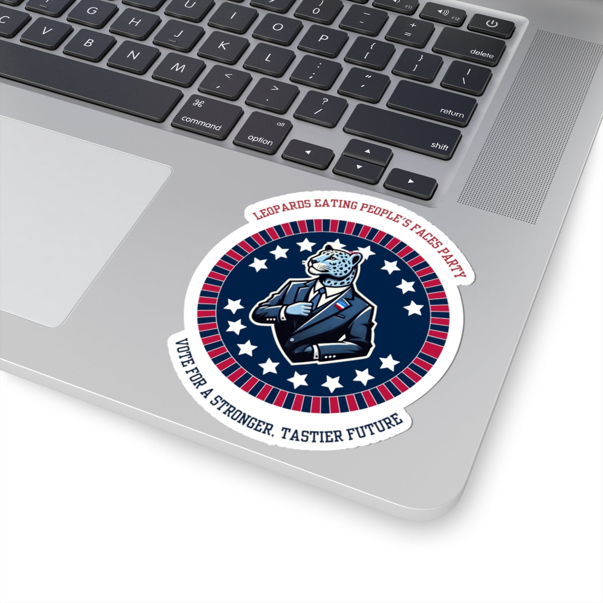 Funny political leopard face eating party sticker on laptop with patriotic design and slogan