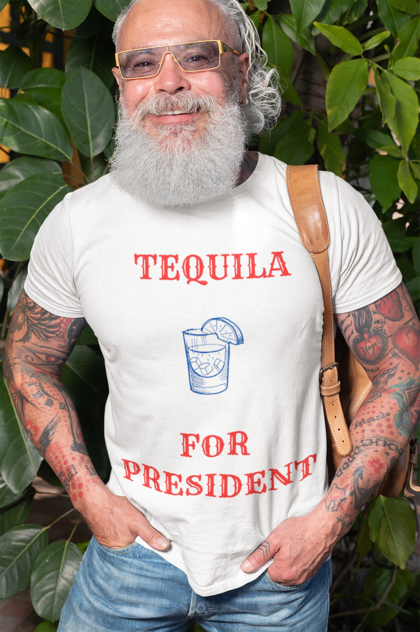 Bearded man wearing white Printify tequila for president political humor t-shirt with red slogan and blue drink illustration