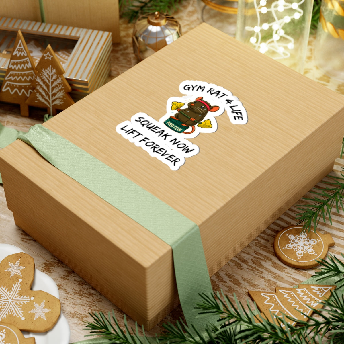 Printify paper gift box on holiday table with gym rat stickers showing muscle rat design for fitness gifts