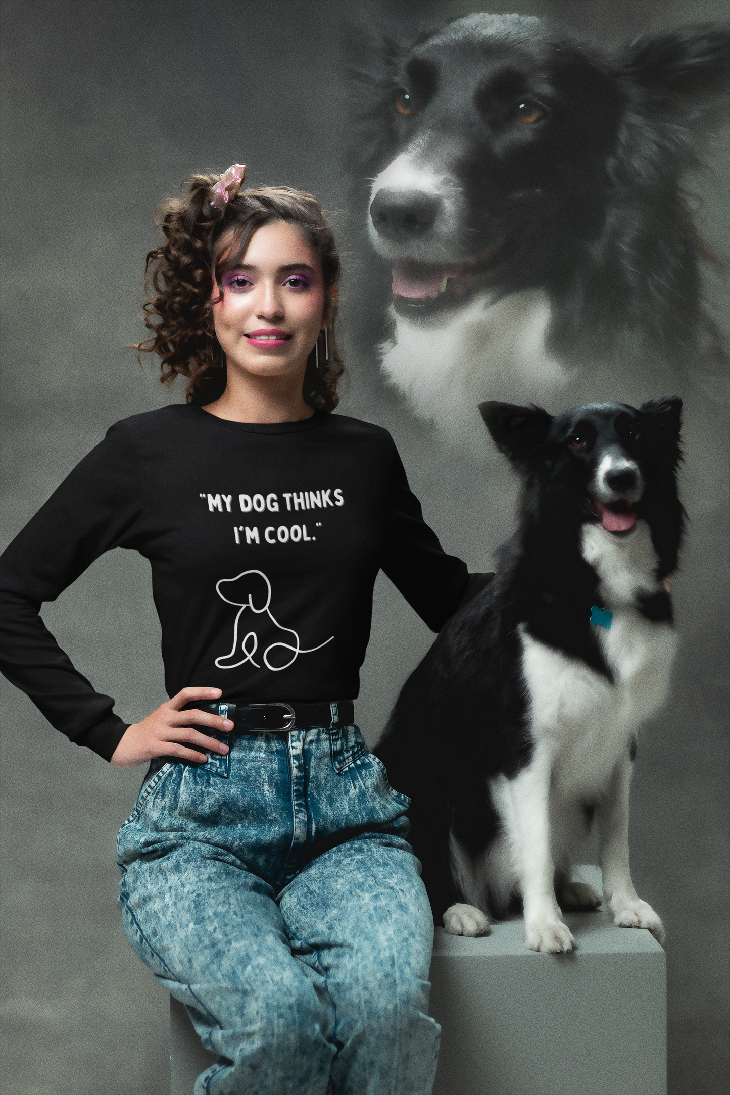Young woman wearing Printify black funny dog lover t shirt with cartoon dog design beside a Border Collie