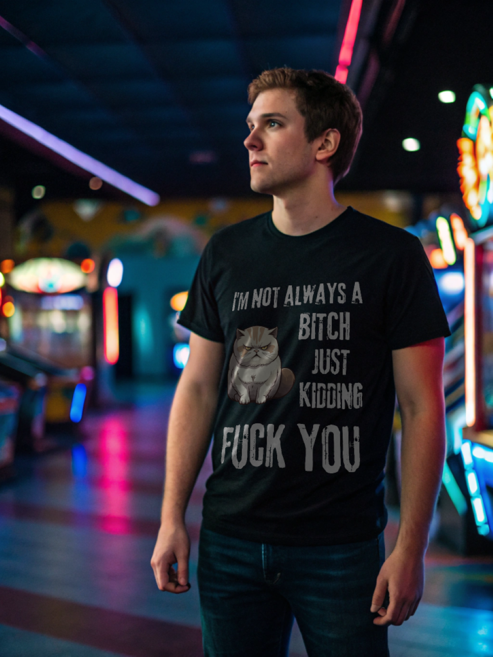 Young man wearing black I'm Not Always a Bitch Cat Unisex Shirt . with grumpy cat print in neon arcade