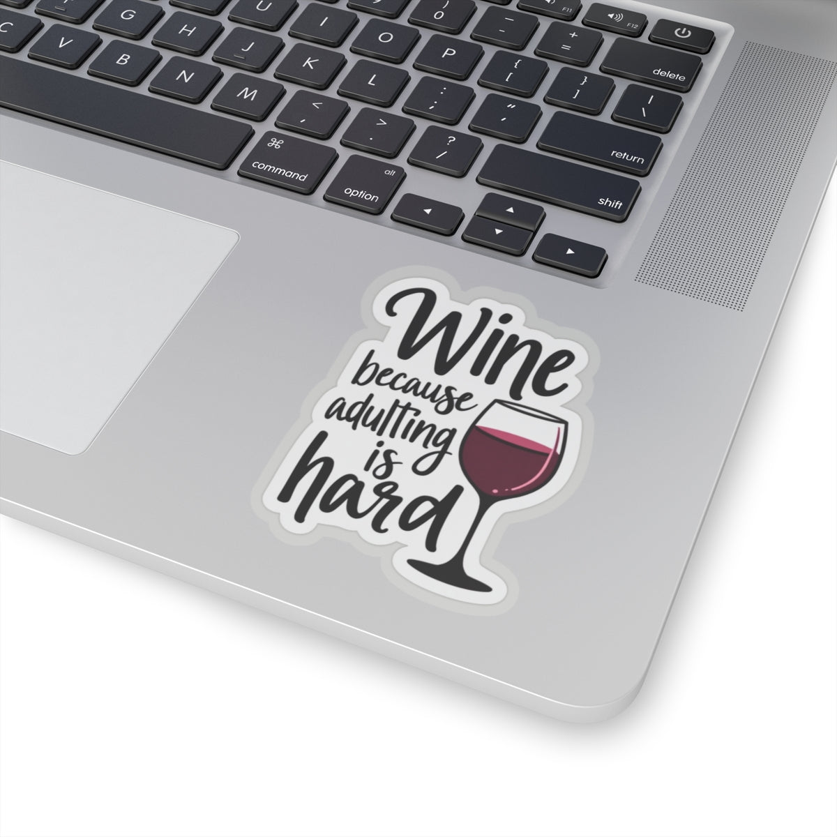 wine because adulting is hard funny sticker with wine glass on laptop keyboard by Printify