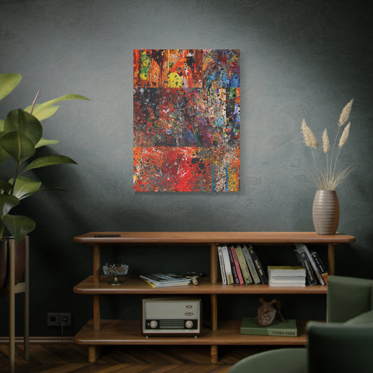 Abstract painting on a wall above a wooden shelf with books and decor.