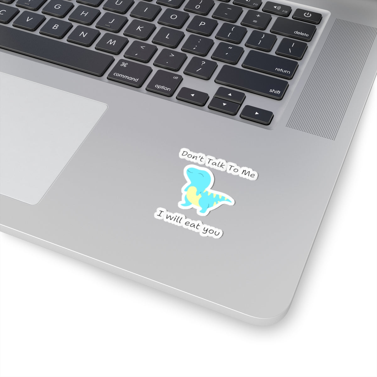 Do not talk to me funny cute dino sticker with blue dinosaur on silver laptop corner
