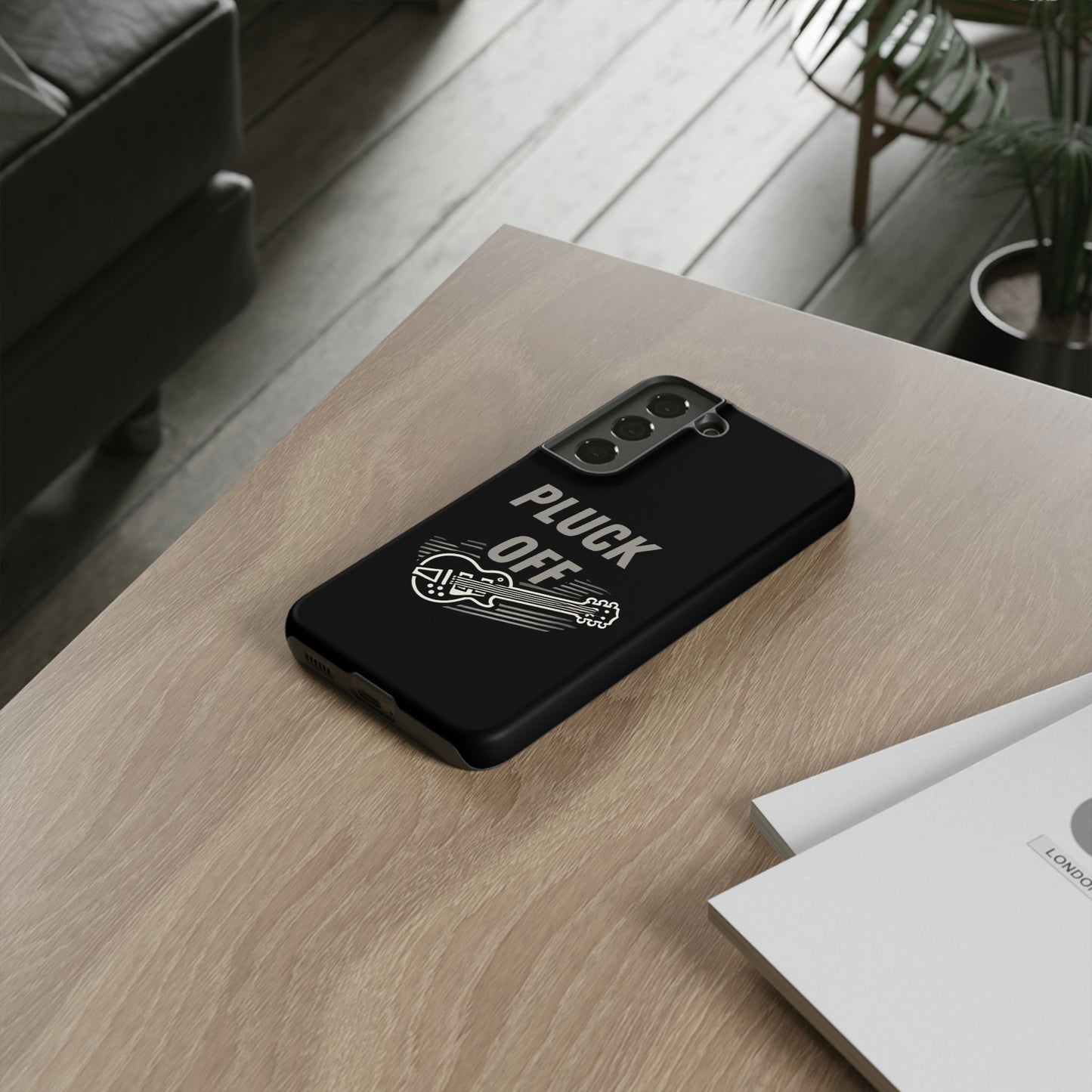 Funny pluck off tough phone case featuring a guitar design on a dark background