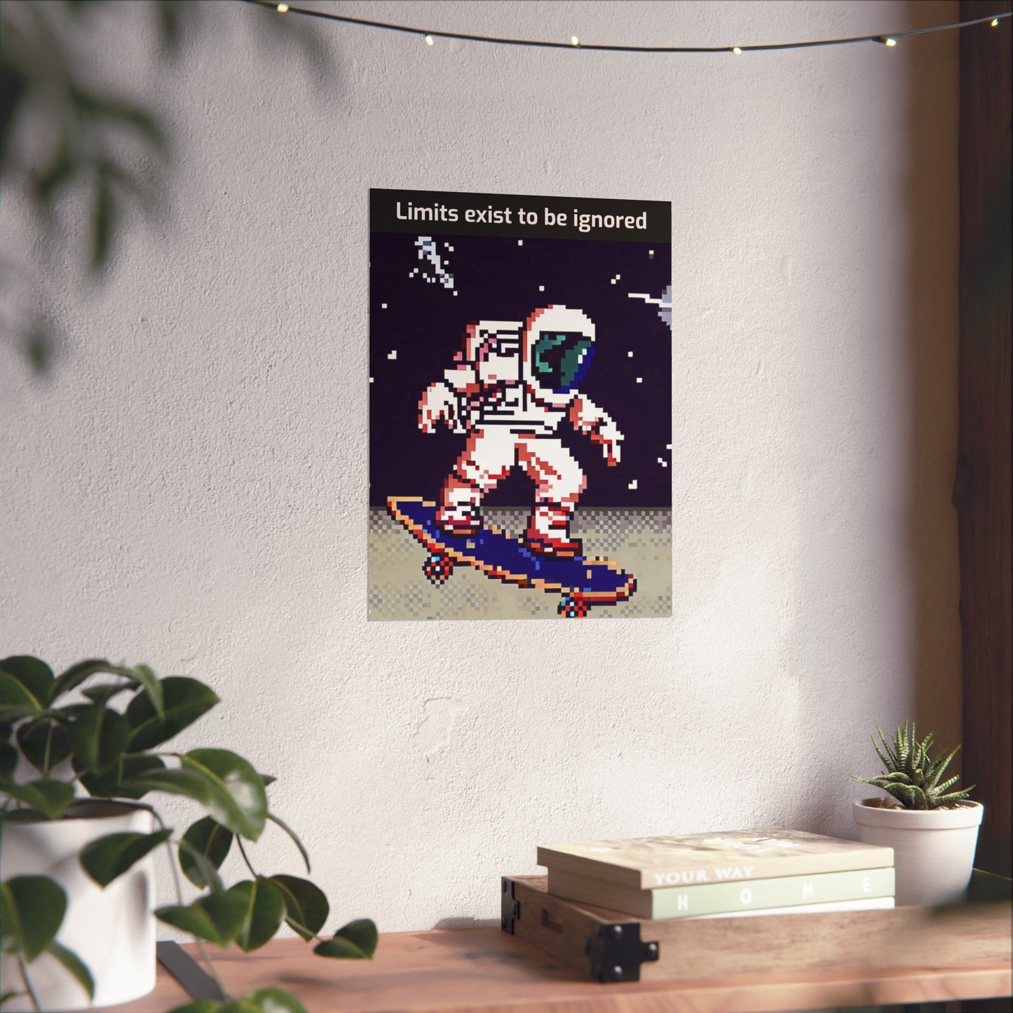 Pixel art astronaut skateboard motivational poster with Limits exist to be ignored quote hanging on wall